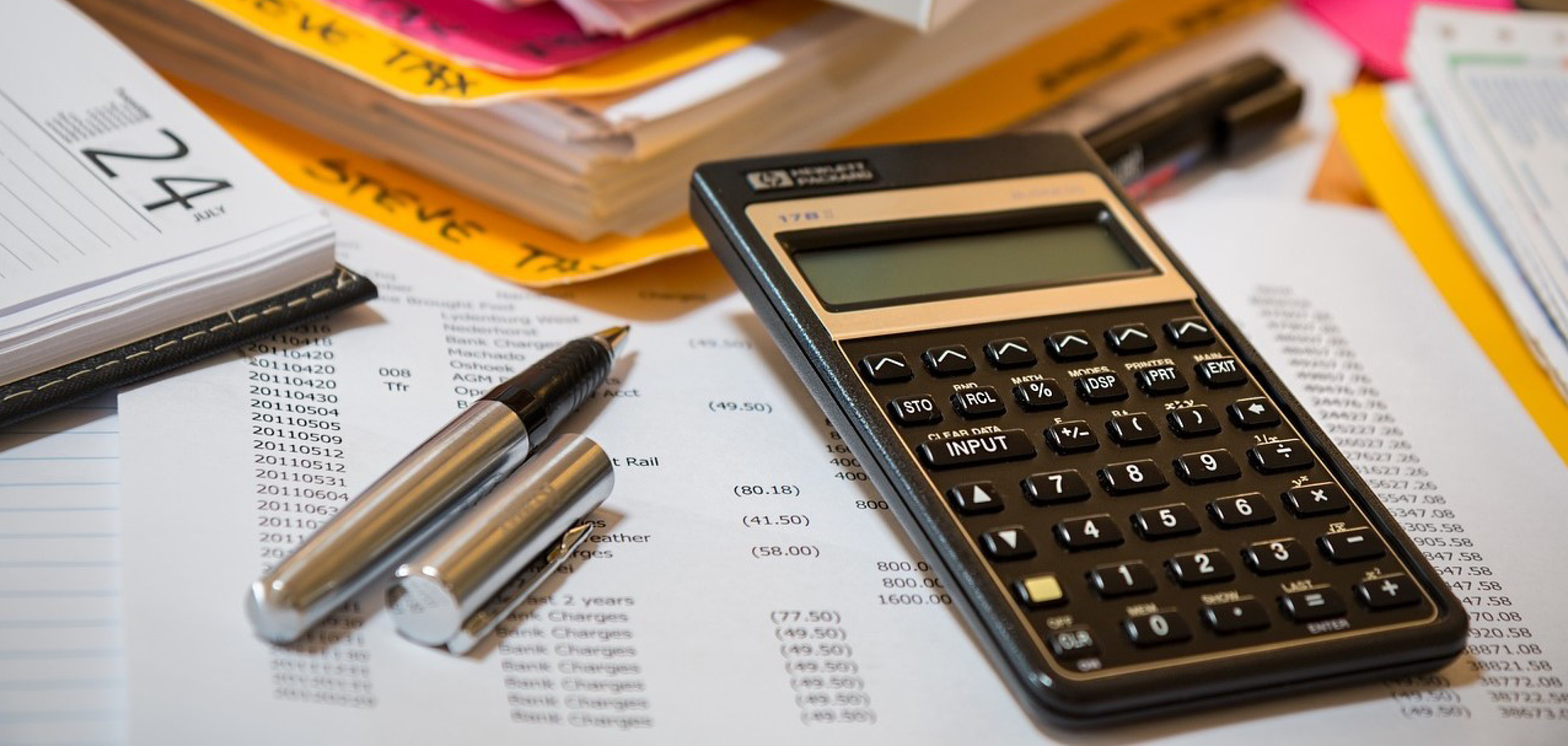 Calculator on a stack of tax papers