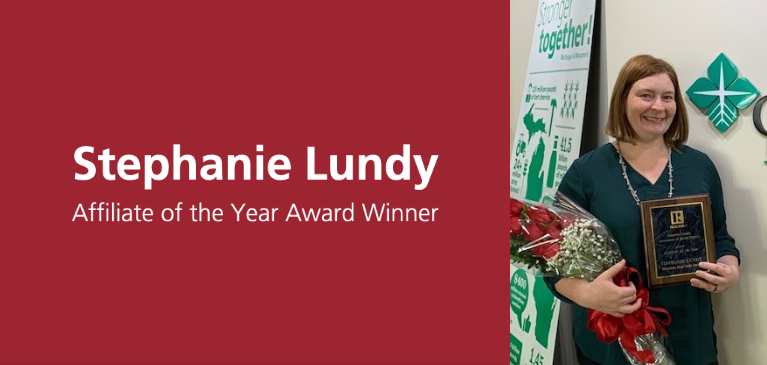 Stephanie Lundy with award 
