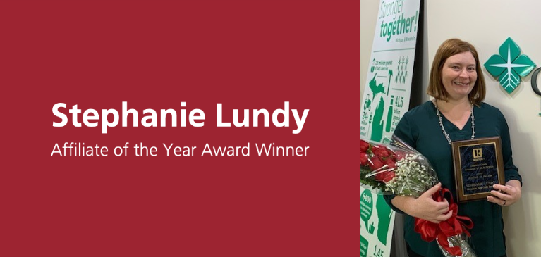 Stephanie Lundy with award