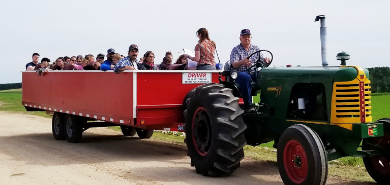 Brunch on the Farm-Tractor pulling a group of attendees