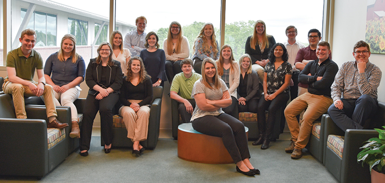 GreenSotne’s 2019 class of interns posing for a group photo on the third floor of the cooperative’s headquarter building.