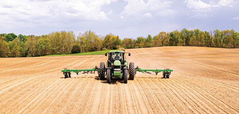 John Deere tractor in field