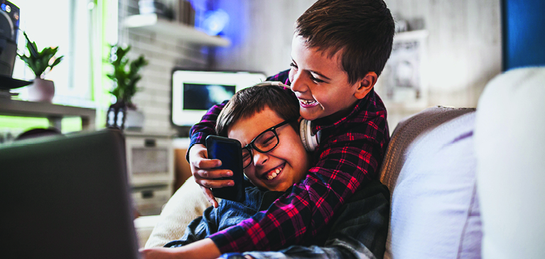 Kids playing on a computer