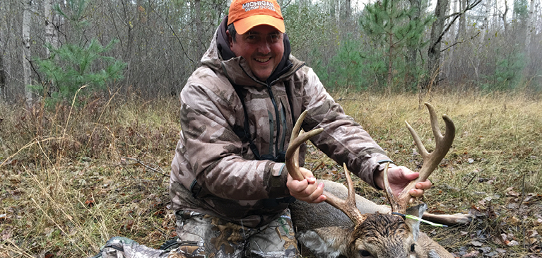 Hunter and deer