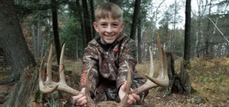 Trayton Norder with his first place junior buck contest deer. 