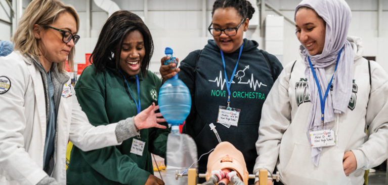 Group of woman who are working on a school project