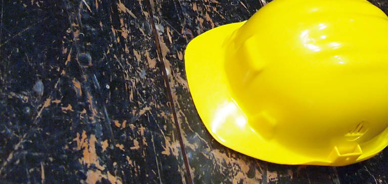Yellow Hard Hat on Wood