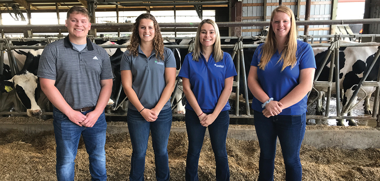 Dennis Cantrell, Lauren Voelker, MacKenzie Clare and Angela Junglbluth on a farm