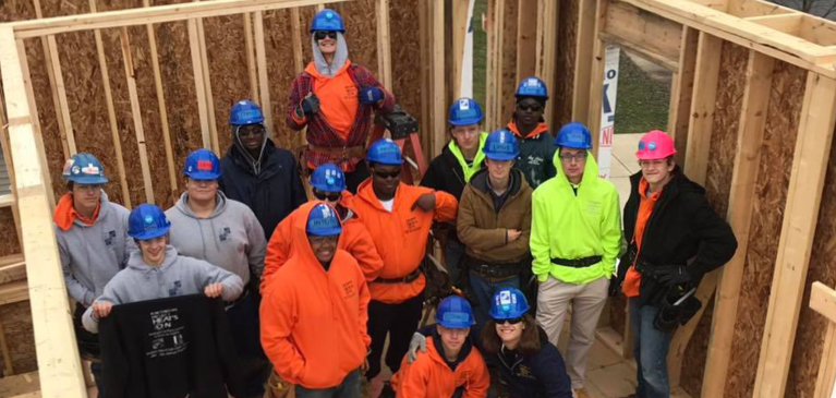 Students in the construction class on construction site