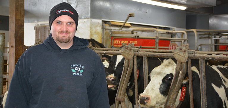 041818-next-generation-transformation Tyler Wagner with his dairy cows