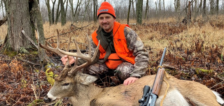 Wisconsin deer challenge winner with his buck