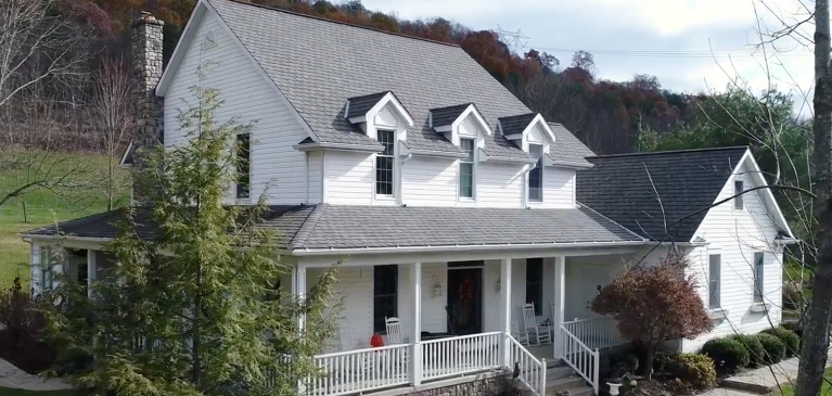 White, two story home in the country