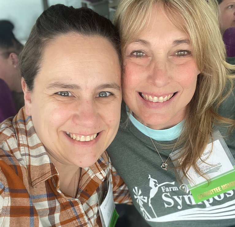 Farm Women's Symposium photographer Christina Gelder and another attendee