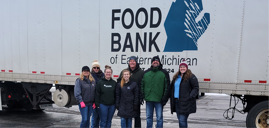 Caro Branch employees volunteering at the Food Bank of Eastern Michigan 