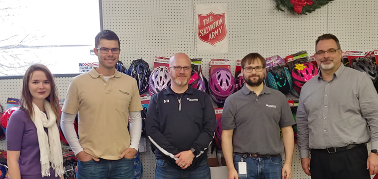 Photo of GreenStone employees volunteering at Salvation Army
