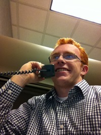 Henry on a conference call