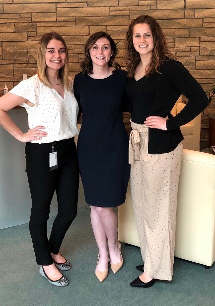 Emily Kropf, McKenzie Claire, Lauren Voelker pose for a photo. 