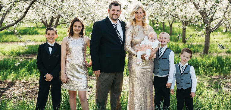 GreenStone cherry farmer and grow forward recipient John Gallagher and his family at the family cherry farm.