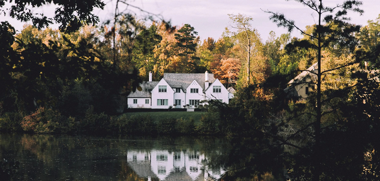 Home surrounded by fall trees