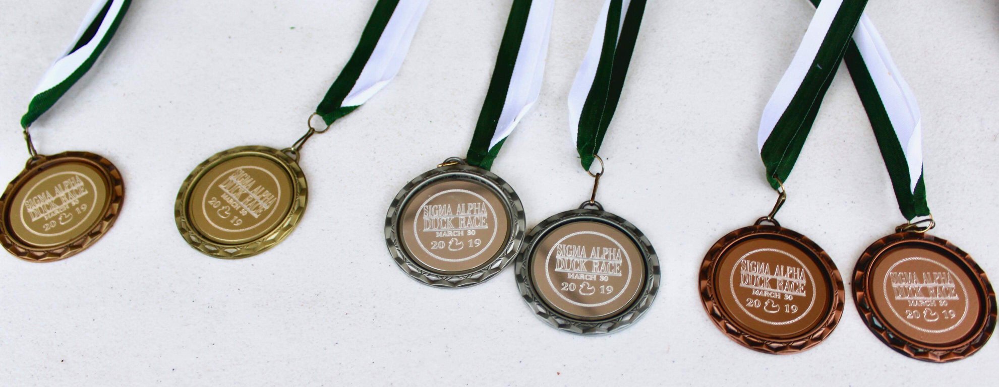 Sigma Alpha 5K Duck Race Medals