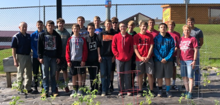 Freedom FFA chapter from Wisconsin help plant and maintain the GreenStone Garden inside the Timber Rattler's stadium.