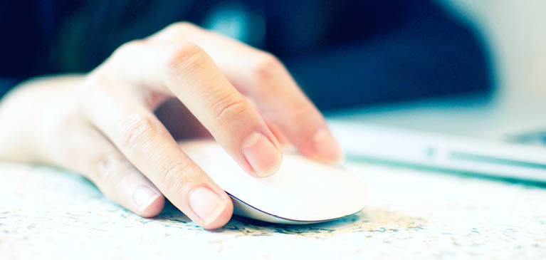 Hand with Mouse by Laptop