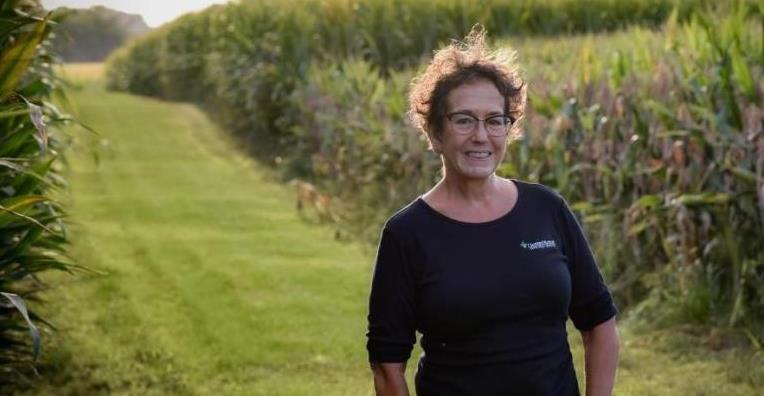 Female farmers standing in field on her farm