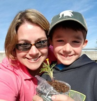 Emelee Rajzer and one of the child participants at the event