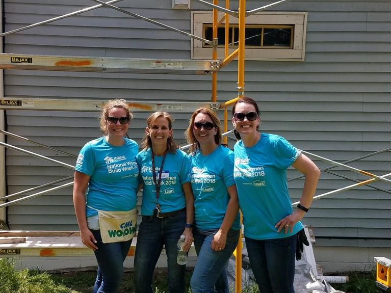Melissa Stolicker with friends at Habitat for Humanity event