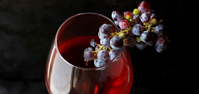Grapes in a glass of wine