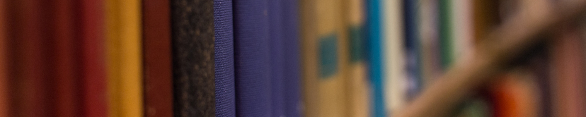 Assorted reference books on shelf