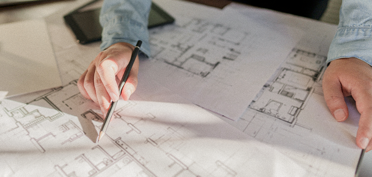 Looking over plans for home construction