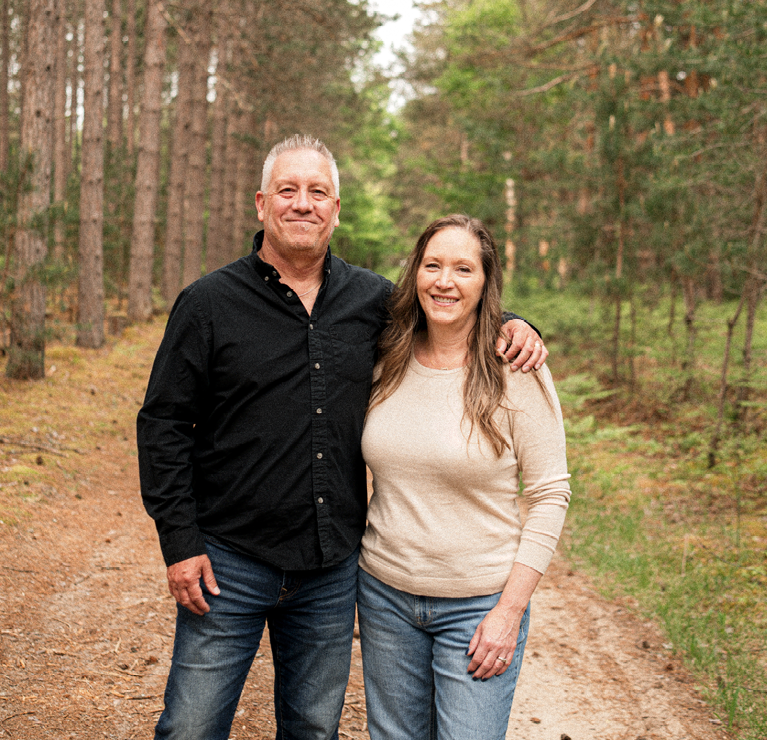 David and Laura Boomer on their recreational land.