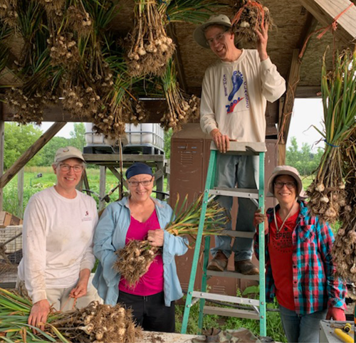 People standing in a food stand