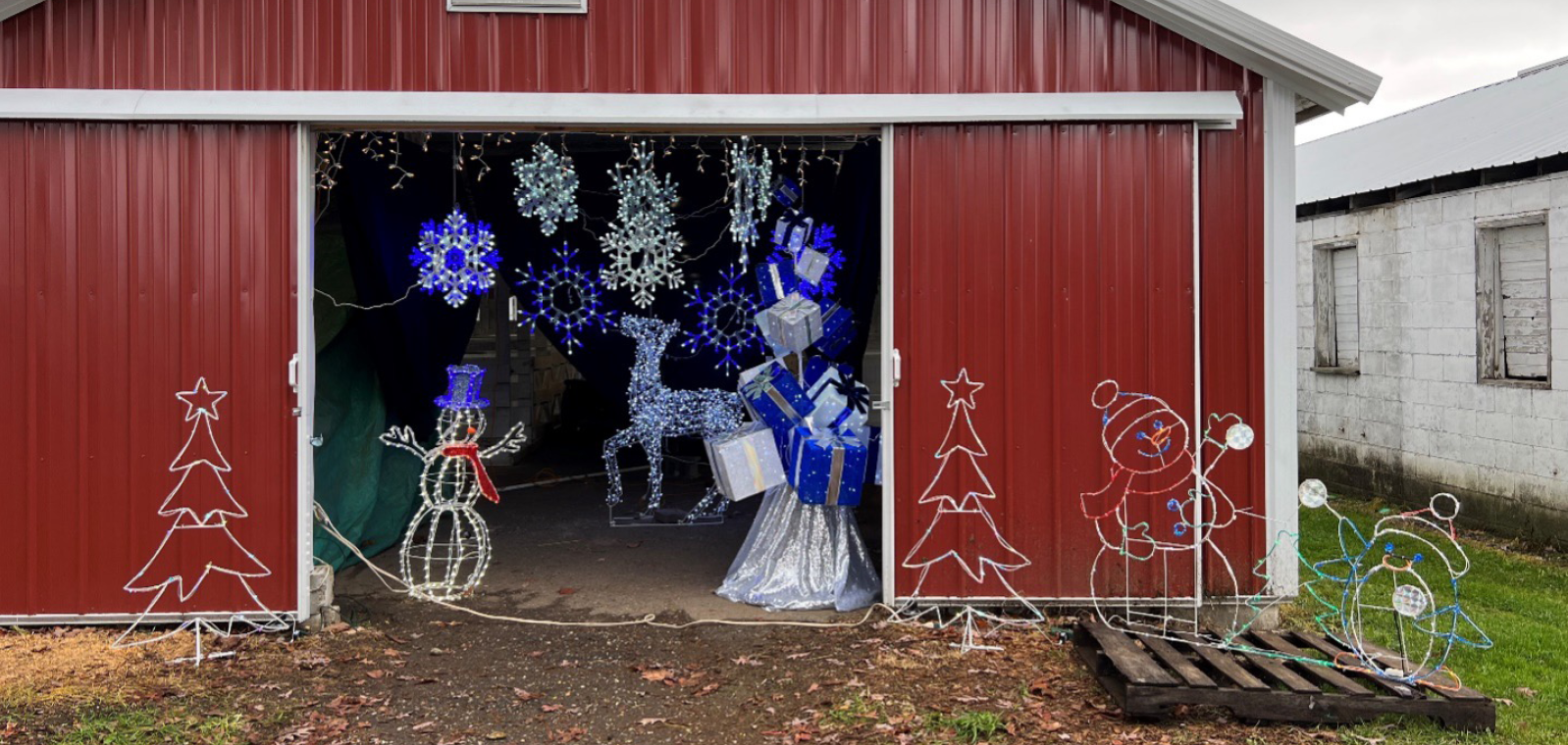 Christmas lights decorated around the barn