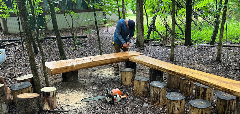 Meals drilling wooden table top into wooden legs