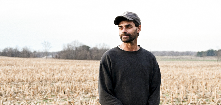 Man standing in field