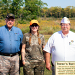 Volunteers of Camp Liberty stand with participants of a veteran hunt
