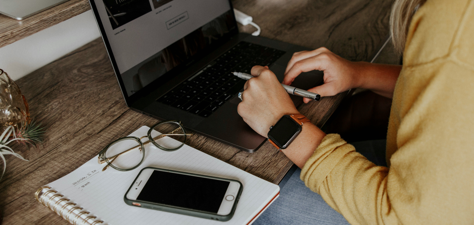 Someone typing on a computer