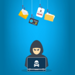 Hacker typing on computer