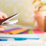 Scissors cutting paper