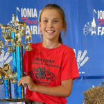 Child Holding Trophy