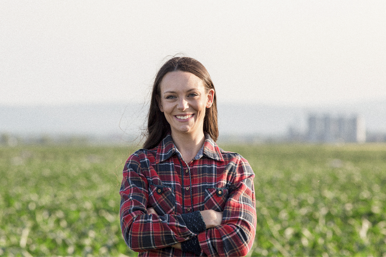 Woman farmer standing in field