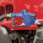 Gas pump filling up a tractor