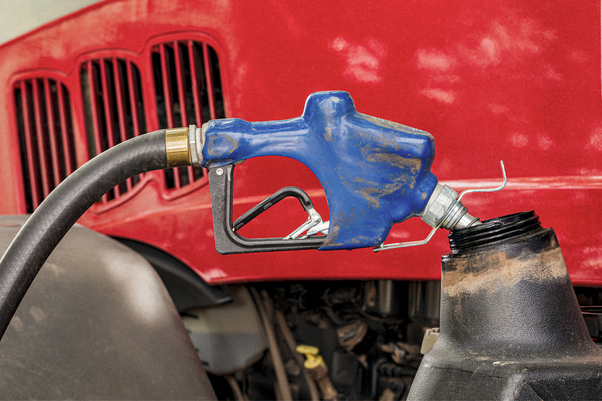 Gas pump filling up a tractor